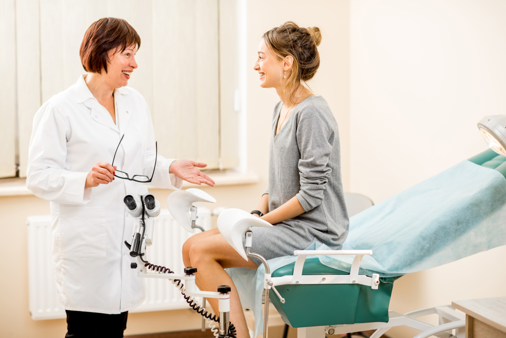 woman talking to her doctor.